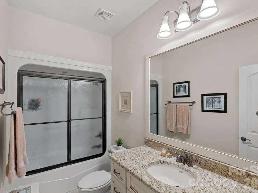 8056 Windsong Road, Denver, NC 28037.  MLS# CAR4338540, YatesRealty ID 3683. En-suite for guest bedroom #1.