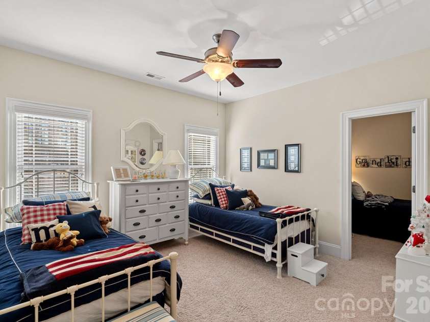 8056 Windsong Road, Denver, NC 28037.  MLS# CAR4338540, YatesRealty ID 3683. Guest bedroom #3 with en-suite bathroom, adjacent to bonus room.