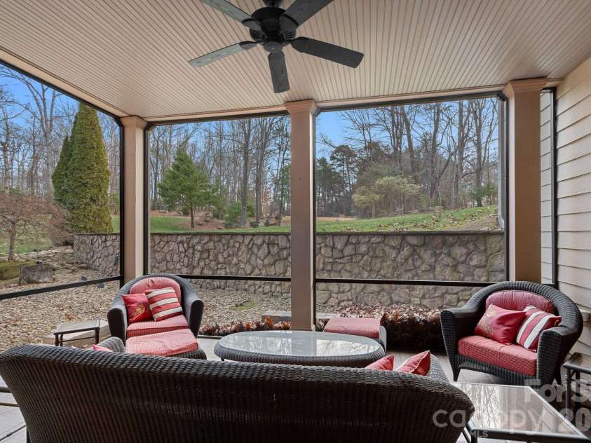 8056 Windsong Road, Denver, NC 28037.  MLS# CAR4338540, YatesRealty ID 3683. Lower-level screened porch.