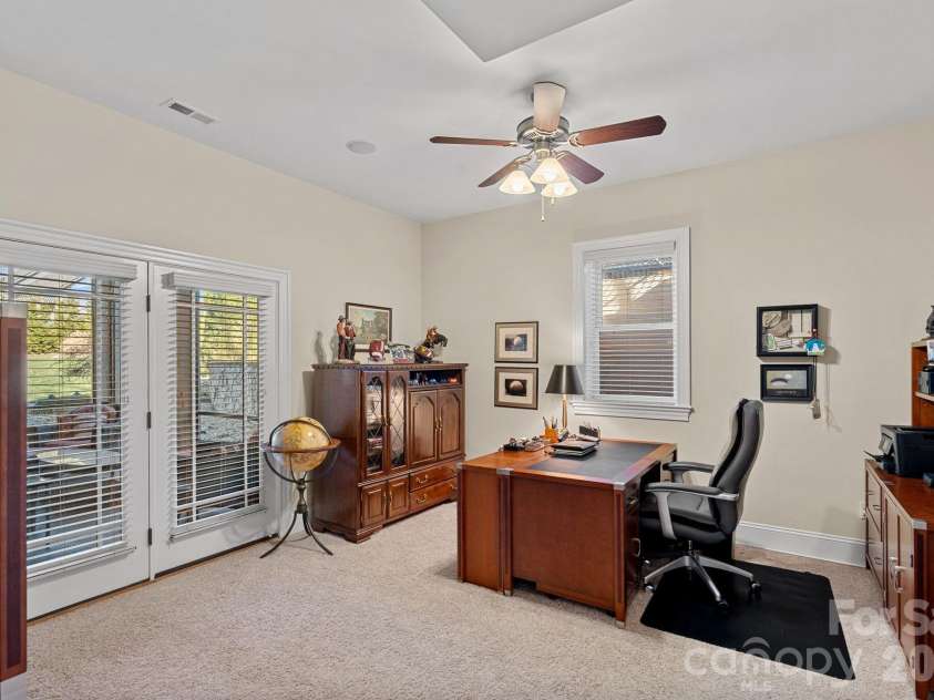 8056 Windsong Road, Denver, NC 28037.  MLS# CAR4338540, YatesRealty ID 3683. Office with access to one of the six outdoor covered areas.