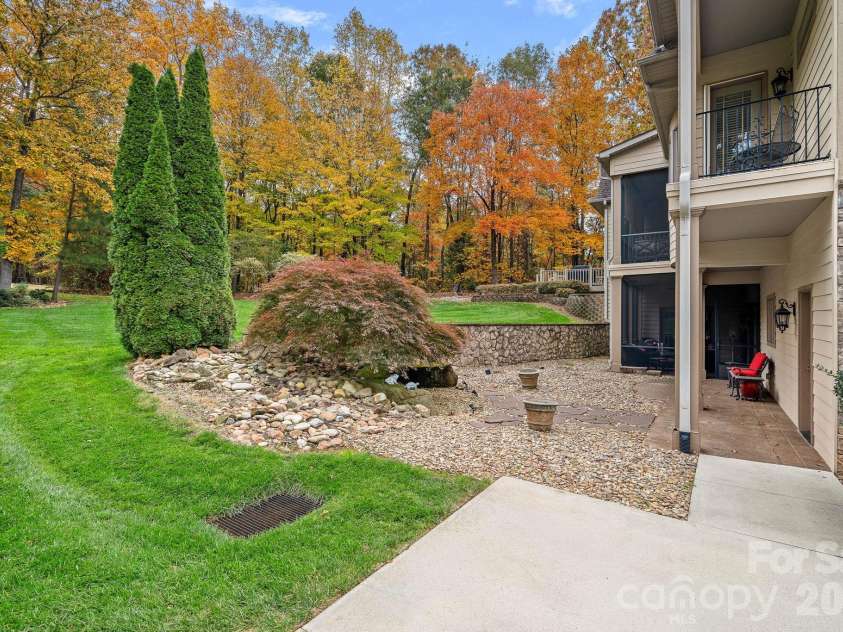 8056 Windsong Road, Denver, NC 28037.  MLS# CAR4338540, YatesRealty ID 3683. Upper: Balcony and screened porch off Primary Suite; Lower: Screened porch and covered patio off basement/lower level.