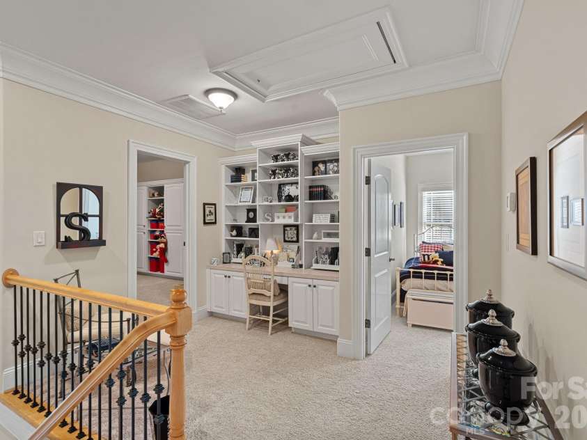 8056 Windsong Road, Denver, NC 28037.  MLS# CAR4338540, YatesRealty ID 3683. Upper landing wtih built-ins and access to play room, guest bedroom #3, and bonus room.