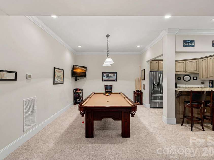 8056 Windsong Road, Denver, NC 28037.  MLS# CAR4338540, YatesRealty ID 3683. Your own private billiards room!