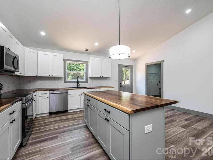 2047 Bailey Drive, Hickory, NC 28601.  MLS# CAR4398528, YatesRealty ID 36830. Stock  Photo- All kitchen cabinets are grey