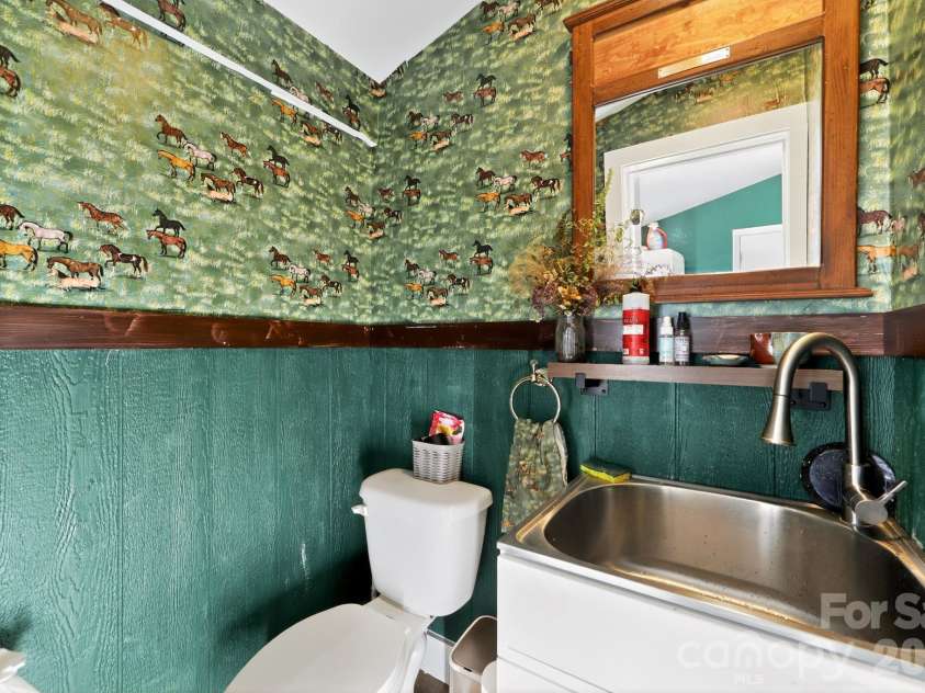 261 & 277 Bent River Farm Road, Pisgah Forest, NC 28768.  MLS# CAR4380957, YatesRealty ID 36835. Tack Room Half Bath