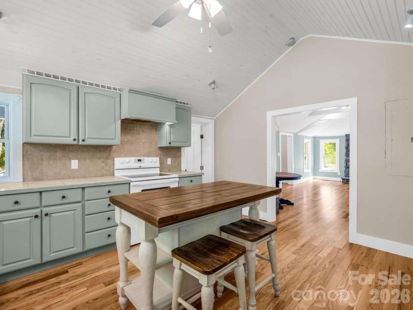 216 Aiken Road, Rosman, NC 28772.  MLS# CAR4401151, YatesRealty ID 36839. Kitchen view from backdoor