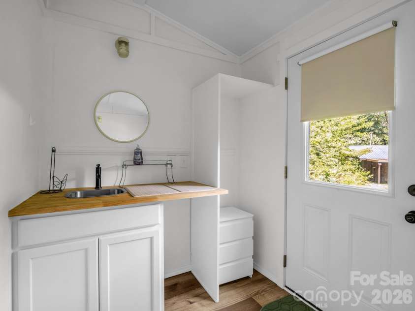216 Aiken Road, Rosman, NC 28772.  MLS# CAR4401151, YatesRealty ID 36839. Tiny home Kitchen area