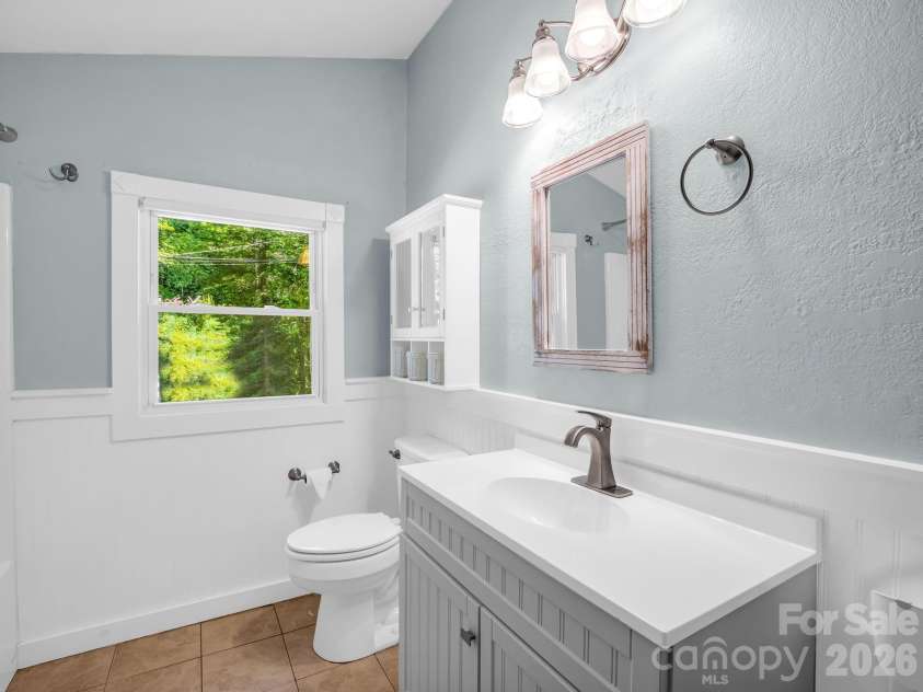 216 Aiken Road, Rosman, NC 28772.  MLS# CAR4401151, YatesRealty ID 36839. Updated bathroom
