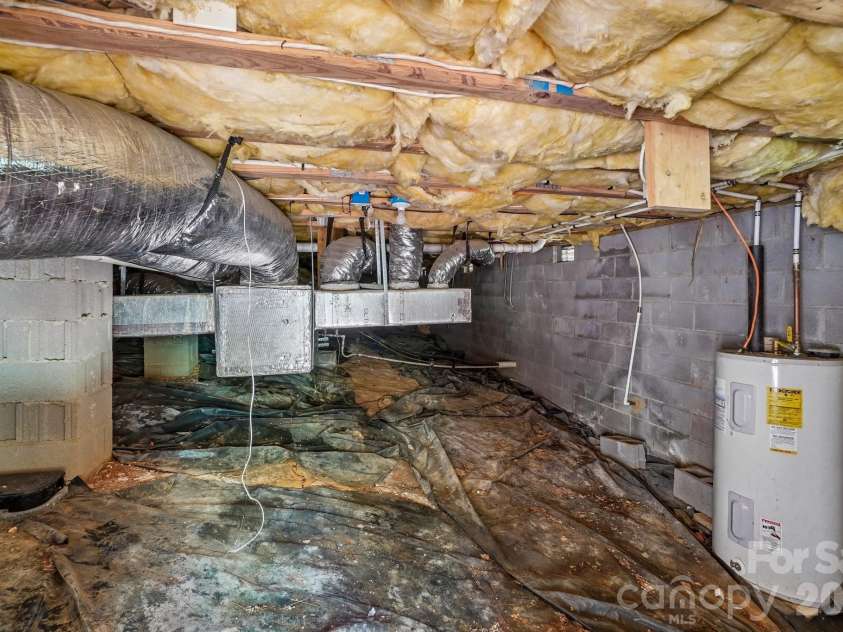 61 Misty Hill Lane, Franklin, NC 28734.  MLS# CAR4400232, YatesRealty ID 36849. Huge crawl space with moisture barrier