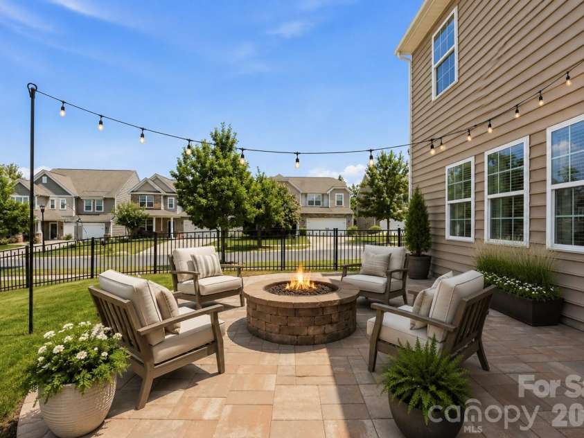 13731 Canterbury Castle Drive, Charlotte, NC 28273.  MLS# CAR4385968, YatesRealty ID 36851. Virtually Staged Fire Pit