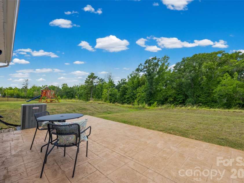 1183 Blackburn Circle, Edgemoor, SC 29712.  MLS# CAR4403052, YatesRealty ID 36856. Back patio