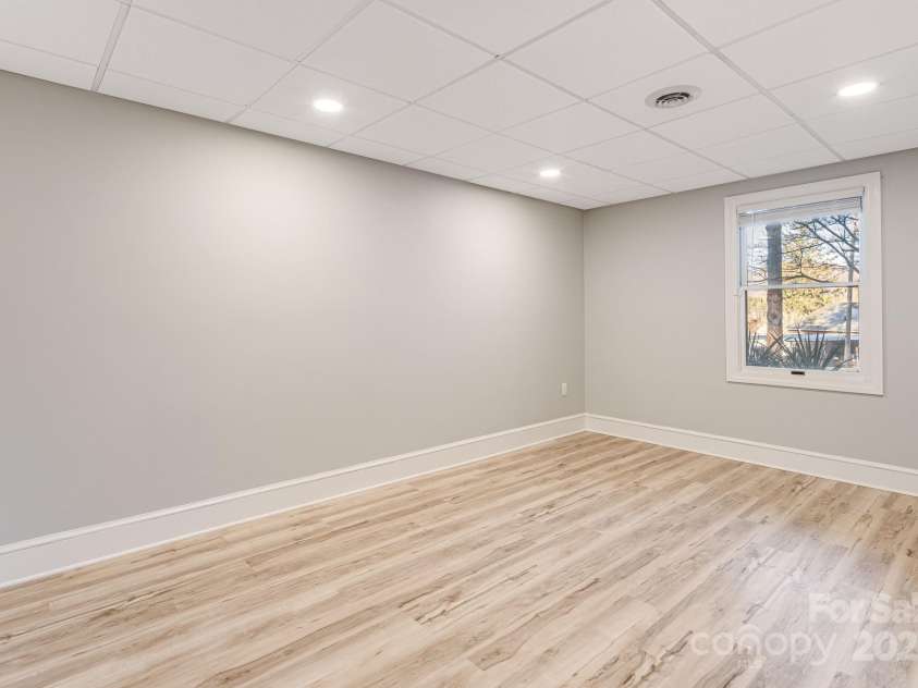 315 Hillside Drive, Burnsville, NC 28714.  MLS# CAR4241007, YatesRealty ID 3686. Lower Level Bedroom