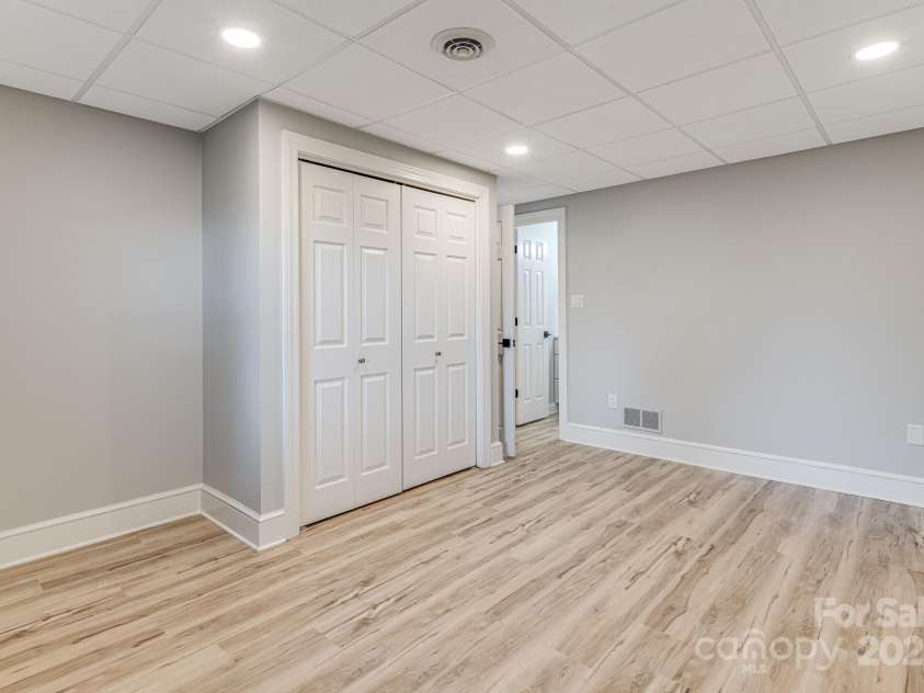 315 Hillside Drive, Burnsville, NC 28714.  MLS# CAR4241007, YatesRealty ID 3686. Lower Level Bedroom