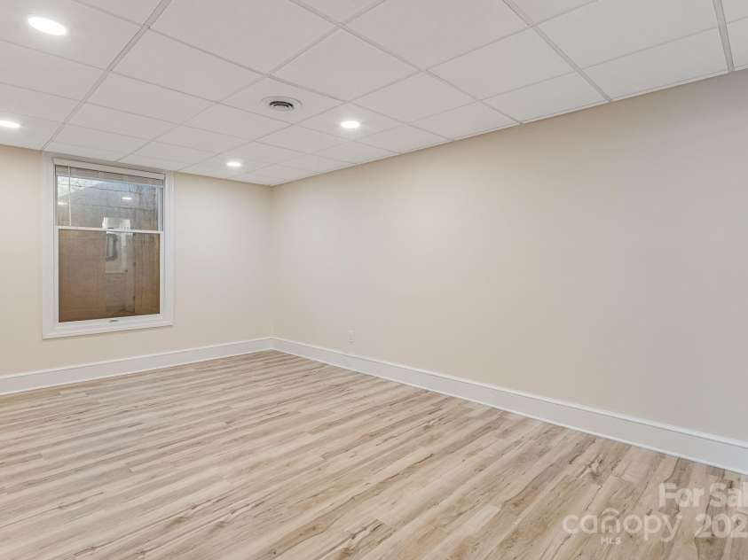 315 Hillside Drive, Burnsville, NC 28714.  MLS# CAR4241007, YatesRealty ID 3686. Lower Level Bedroom