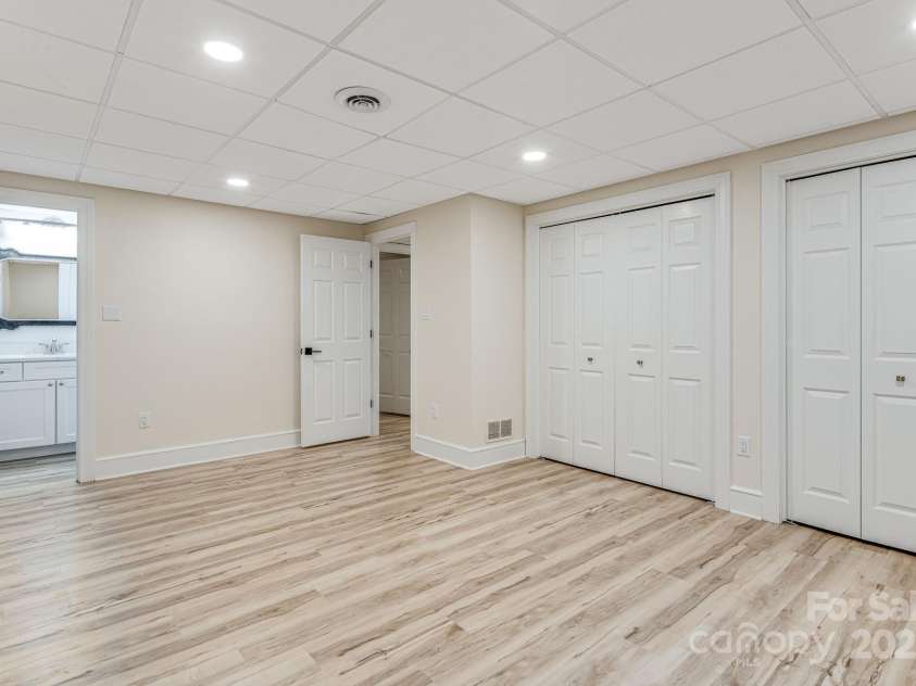 315 Hillside Drive, Burnsville, NC 28714.  MLS# CAR4241007, YatesRealty ID 3686. Lower Level Bedroom