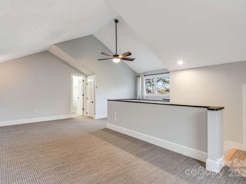 315 Hillside Drive, Burnsville, NC 28714.  MLS# CAR4241007, YatesRealty ID 3686. Upper Level Bedroom