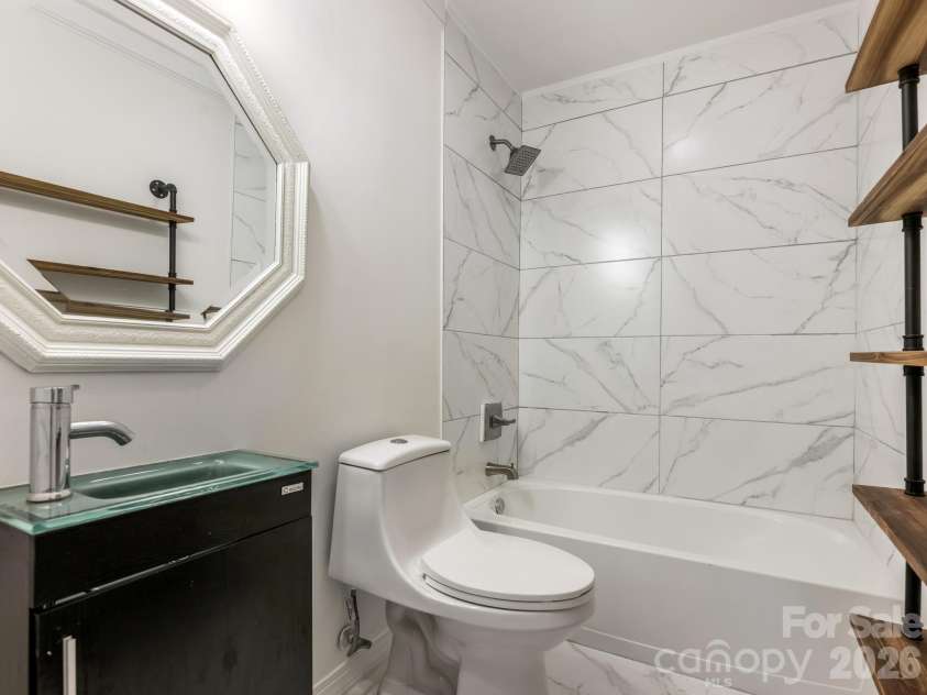 2940 Hosta Drive, Charlotte, NC 28269.  MLS# CAR4398413, YatesRealty ID 36862. Second full bath means your household's morning routine actually flows smoothly. Two bathrooms serve everyone comfortably.