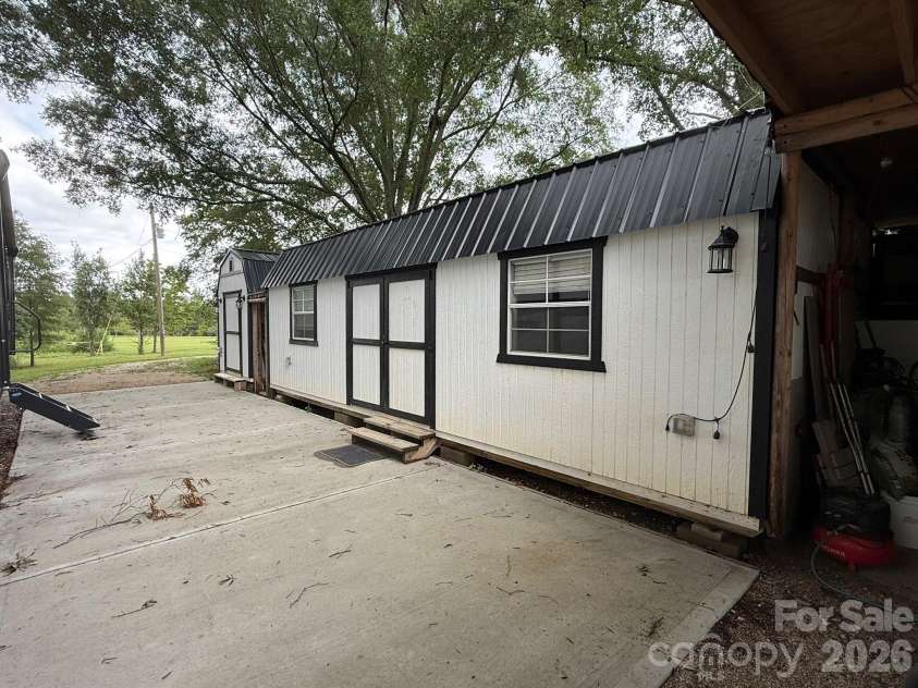 1726 Old Cheraw Highway, Rockingham, NC 28379.  MLS# CAR4403632, YatesRealty ID 36875. Multiple storage buildings convey as is