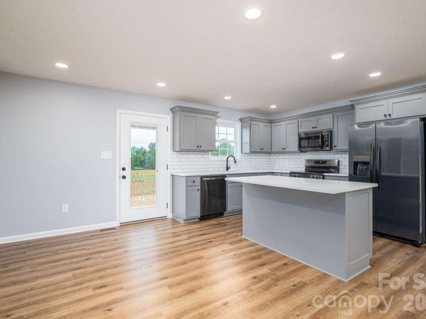 307 Northbrook III School Road, Vale, NC 28168.  MLS# CAR4403635, YatesRealty ID 36876. Kitchen & Dining Area