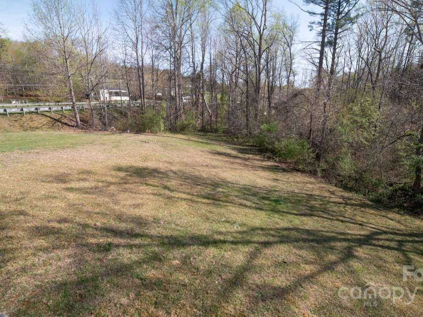 4001 US 64 Highway, Morganton, NC 28655.  MLS# CAR4241669, YatesRealty ID 3688. Side yard