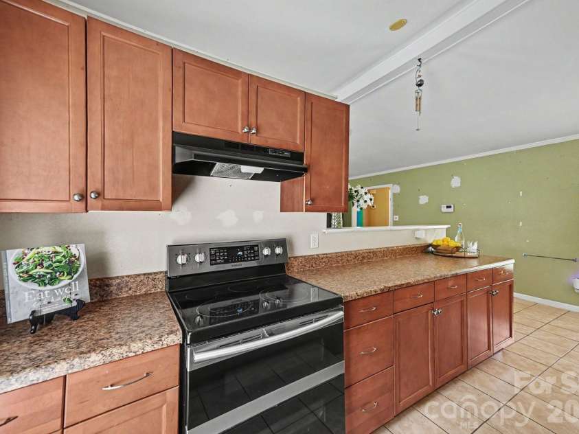 6200 Dwightware Boulevard, Charlotte, NC 28227.  MLS# CAR4403876, YatesRealty ID 36883. Another view of the kitchen
