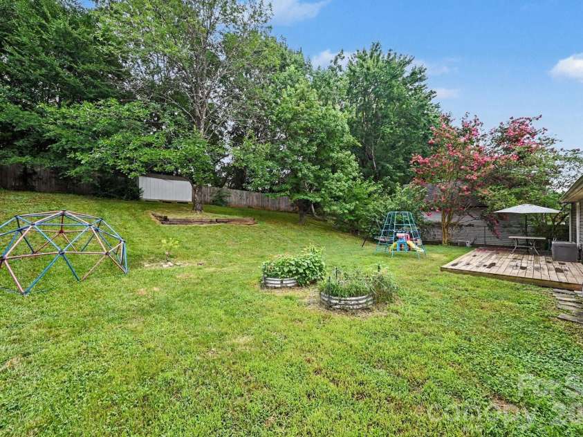 6200 Dwightware Boulevard, Charlotte, NC 28227.  MLS# CAR4403876, YatesRealty ID 36883. Large deck and shed too!