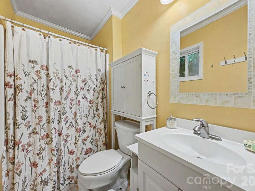 6200 Dwightware Boulevard, Charlotte, NC 28227.  MLS# CAR4403876, YatesRealty ID 36883. Primary bathroom has walk-in shower