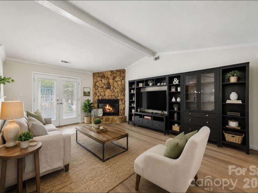 6200 Dwightware Boulevard, Charlotte, NC 28227.  MLS# CAR4403876, YatesRealty ID 36883. Virtually staged to show walls in Albaster by Sherwin Williams and a nice wood look LVP flooring
