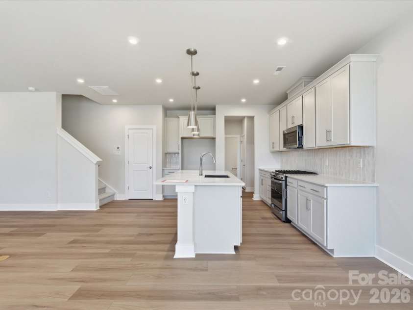 321 Ardmore Drive, Belmont, NC 28012.  MLS# CAR4404209, YatesRealty ID 36887. Chef-inspired kitchen with white cabinets