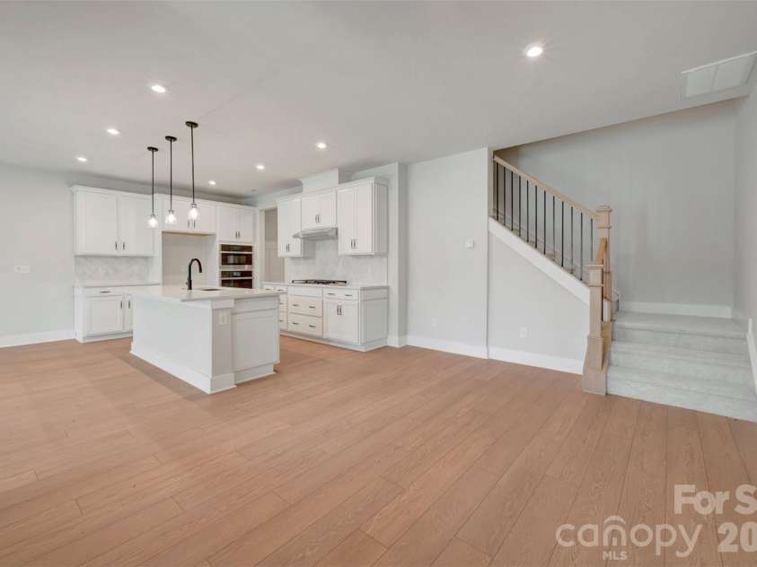 314 Ardmore Drive, Belmont, NC 28012.  MLS# CAR4404249, YatesRealty ID 36893. Dining space and stairs with open rails