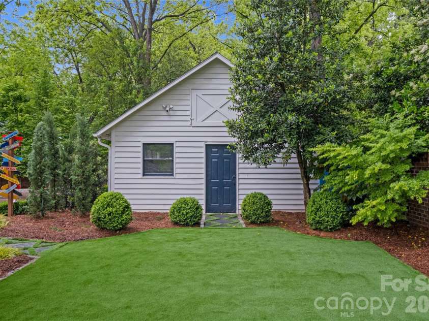 2100 The Plaza Road, Charlotte, NC 28205.  MLS# CAR4403226, YatesRealty ID 36916. 2 car garage with workshop