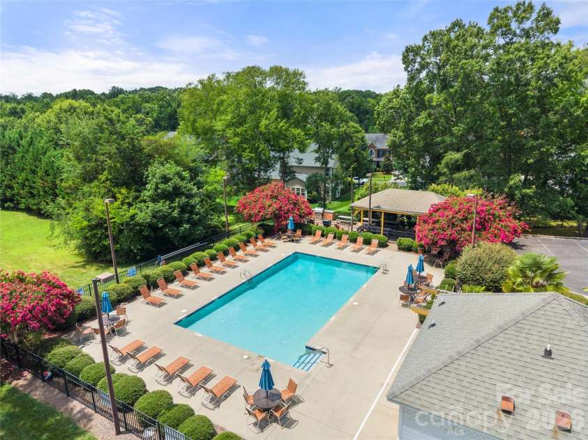 557 Fair Oaks Drive, Fort Mill, SC 29708.  MLS# CAR4403239, YatesRealty ID 36924. Community pool