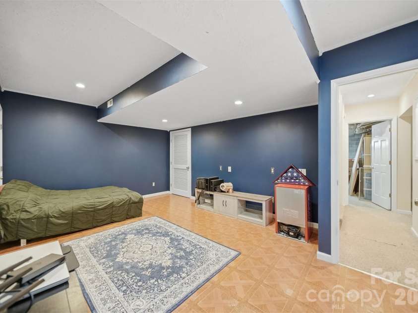 277 Rembrandt Drive, Boone, NC 28607.  MLS# CAR4404403, YatesRealty ID 36928. Lower Primary Suite