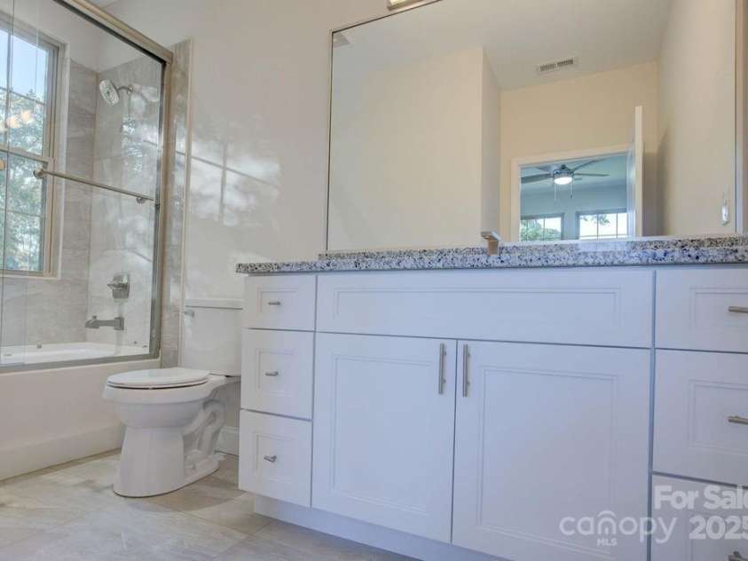 5125 Isaac Drive, Charlotte, NC 28216.  MLS# CAR4281649, YatesRealty ID 3693. Bedroom 2 (bathroom)