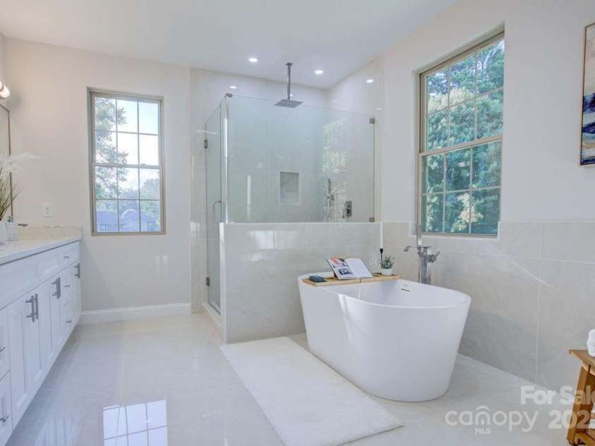 5125 Isaac Drive, Charlotte, NC 28216.  MLS# CAR4281649, YatesRealty ID 3693. Primary bathroom