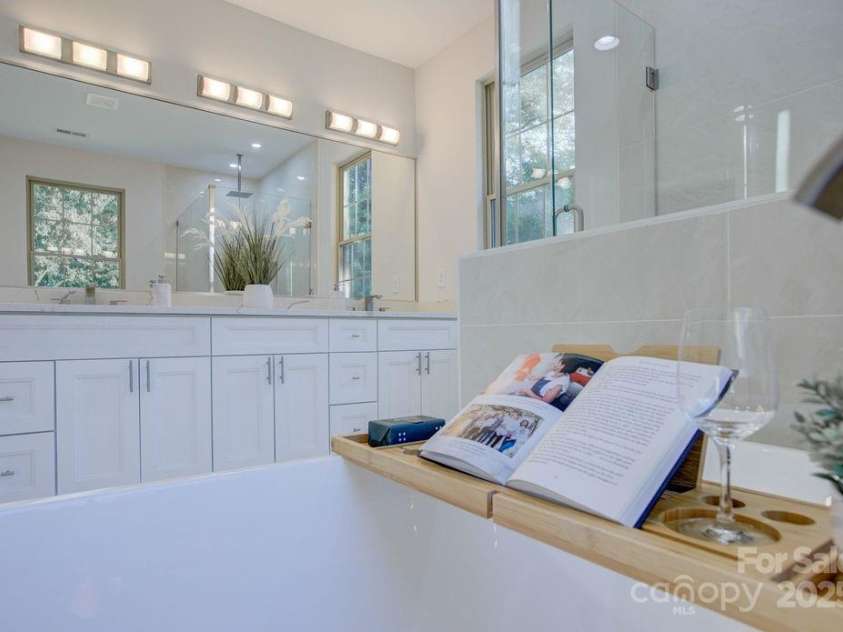 5125 Isaac Drive, Charlotte, NC 28216.  MLS# CAR4281649, YatesRealty ID 3693. Primary bathroom