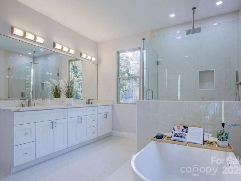 5125 Isaac Drive, Charlotte, NC 28216.  MLS# CAR4281649, YatesRealty ID 3693. Primary bathroom