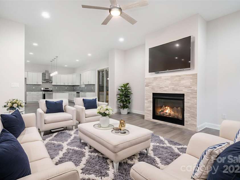 5125 Isaac Drive, Charlotte, NC 28216.  MLS# CAR4327672, YatesRealty ID 3693. Open living & kitchen area *Virtually Staged*