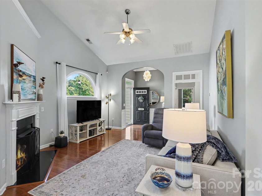200 Park View Drive, Belmont, NC 28012.  MLS# CAR4397923, YatesRealty ID 36933. Living room with fireplace.