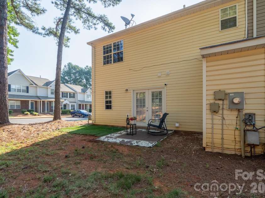 6491 Saint Bernard Way, Charlotte, NC 28269.  MLS# CAR4400216, YatesRealty ID 36939. Back Patio
