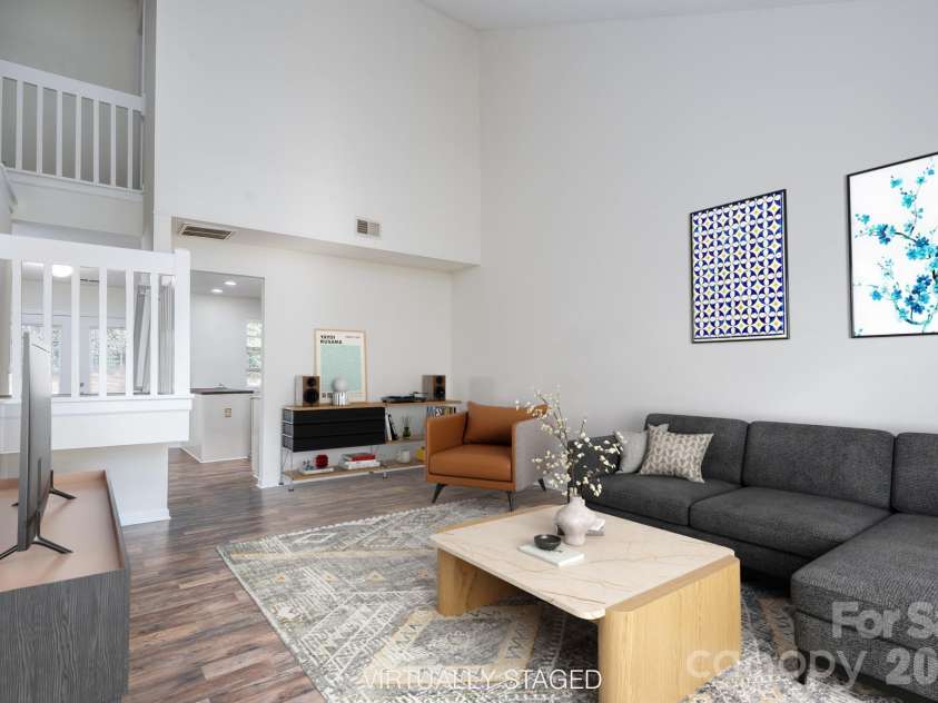 6491 Saint Bernard Way, Charlotte, NC 28269.  MLS# CAR4400216, YatesRealty ID 36939. Living Room Virtual Stage