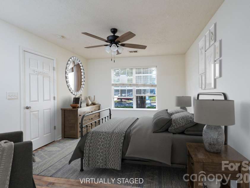 6491 Saint Bernard Way, Charlotte, NC 28269.  MLS# CAR4400216, YatesRealty ID 36939. Primary Bedroom Virtual Stage