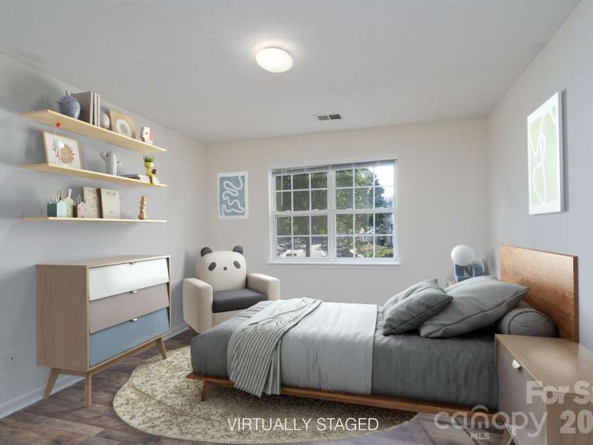 6491 Saint Bernard Way, Charlotte, NC 28269.  MLS# CAR4400216, YatesRealty ID 36939. Upstairs Bed 2 Virtual Stage