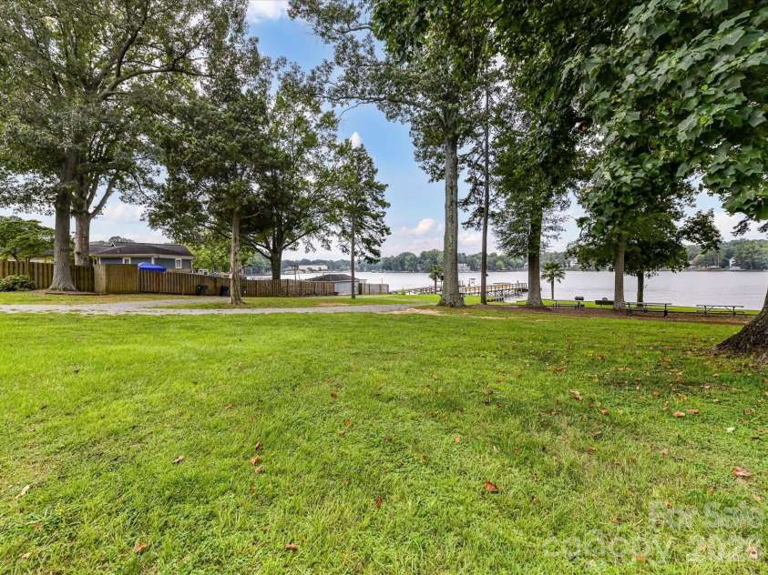 21416 Verano Place, Cornelius, NC 28031.  MLS# CAR4378755, YatesRealty ID 36940. Access Lot Grass Area