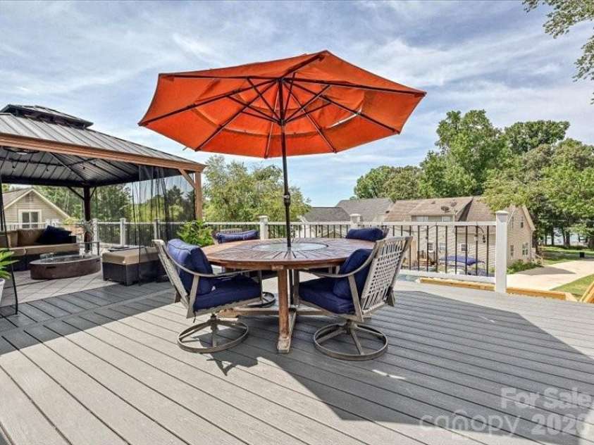21416 Verano Place, Cornelius, NC 28031.  MLS# CAR4378755, YatesRealty ID 36940. Deck off kitchen