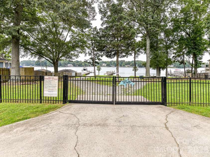 21416 Verano Place, Cornelius, NC 28031.  MLS# CAR4378755, YatesRealty ID 36940. Entrance to Community Access Lot