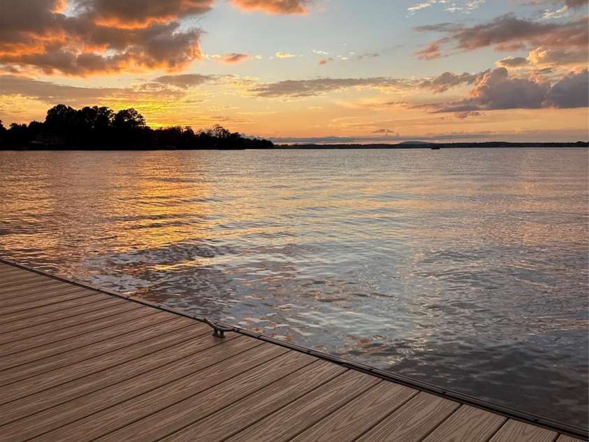21416 Verano Place, Cornelius, NC 28031.  MLS# CAR4378755, YatesRealty ID 36940. Sunset on the Access Lot Dock