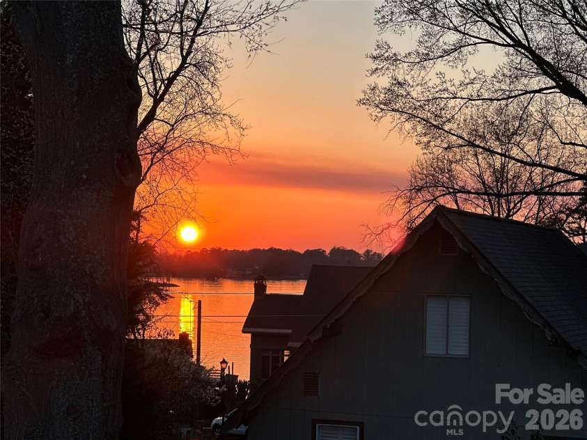 21416 Verano Place, Cornelius, NC 28031.  MLS# CAR4378755, YatesRealty ID 36940. Sunset View off the Deck