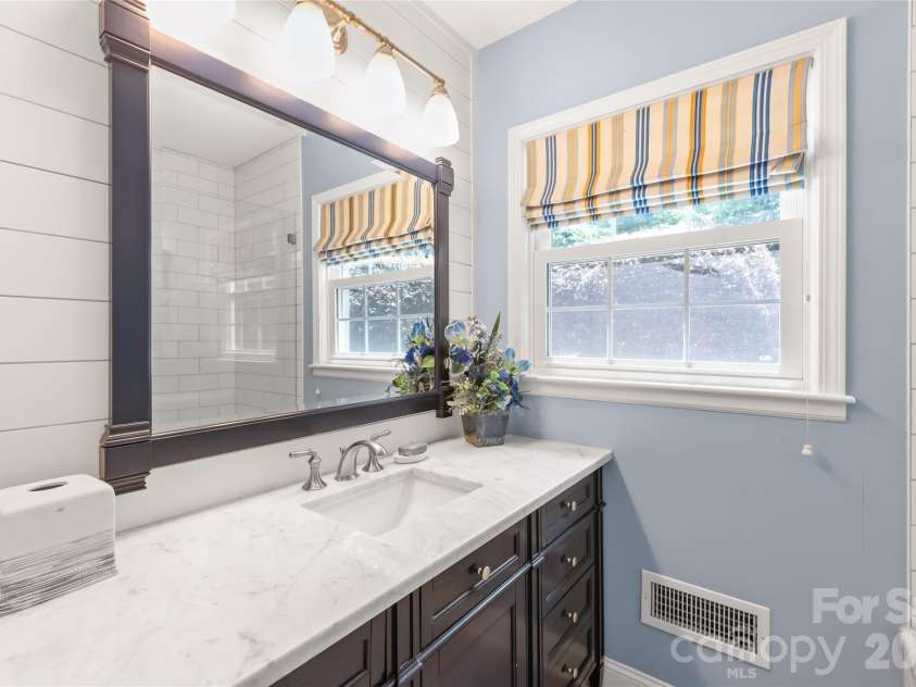 301 Fairway Drive, Fort Mill, SC 29715.  MLS# CAR4400681, YatesRealty ID 36942. A smart, functional layout...the second sink is perfectly positioned right adjacent to the sleek, modern walk-in shower.