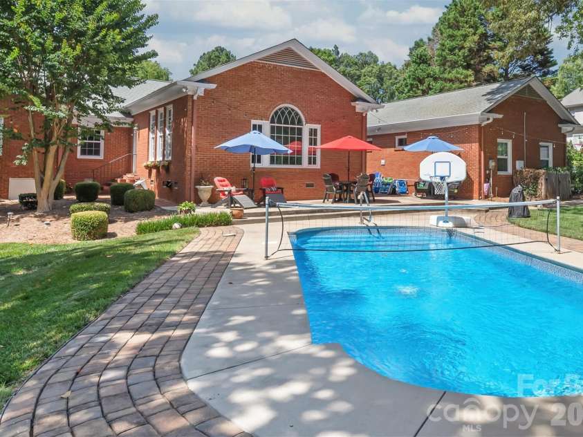 301 Fairway Drive, Fort Mill, SC 29715.  MLS# CAR4400681, YatesRealty ID 36942. Step outside into your own private backyard oasis...the perfect tranquil setting for weekend BBQs, pool days, or just unwinding in the fresh air.